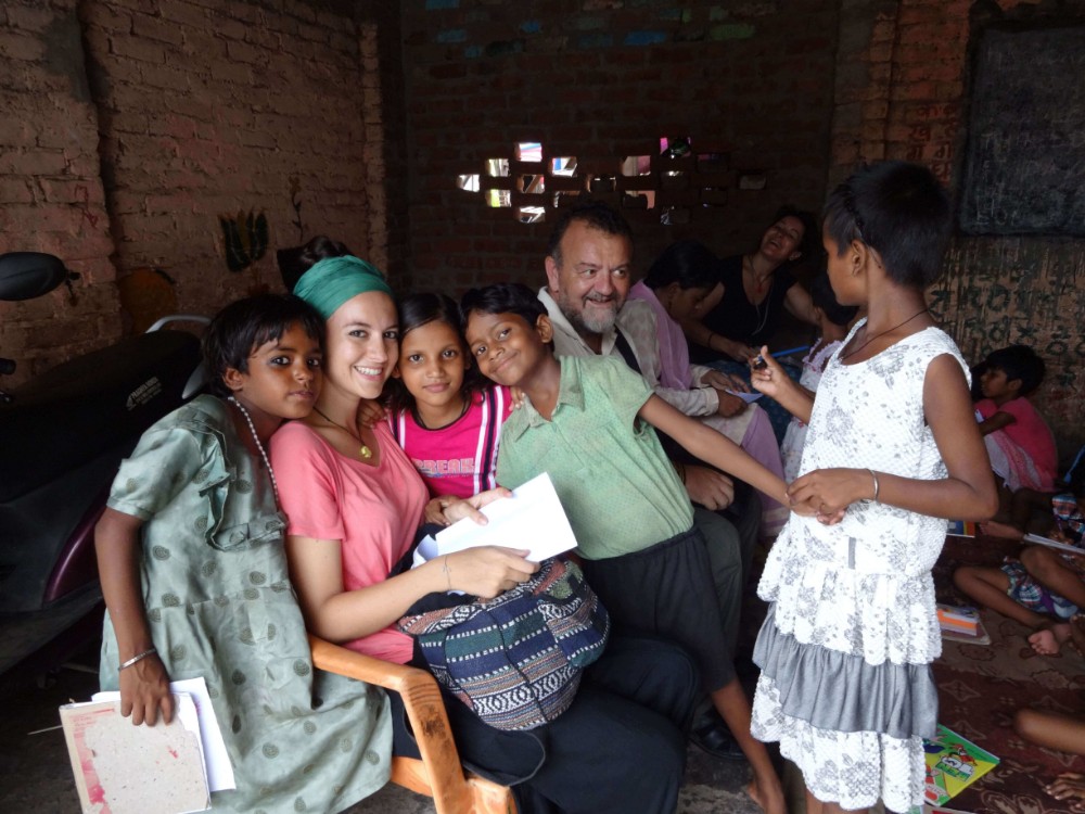 Volunteers teaching kids at a school in Delhi