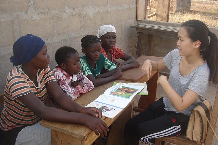 Student from High School Group interacting with students in Tamale, Ghana>