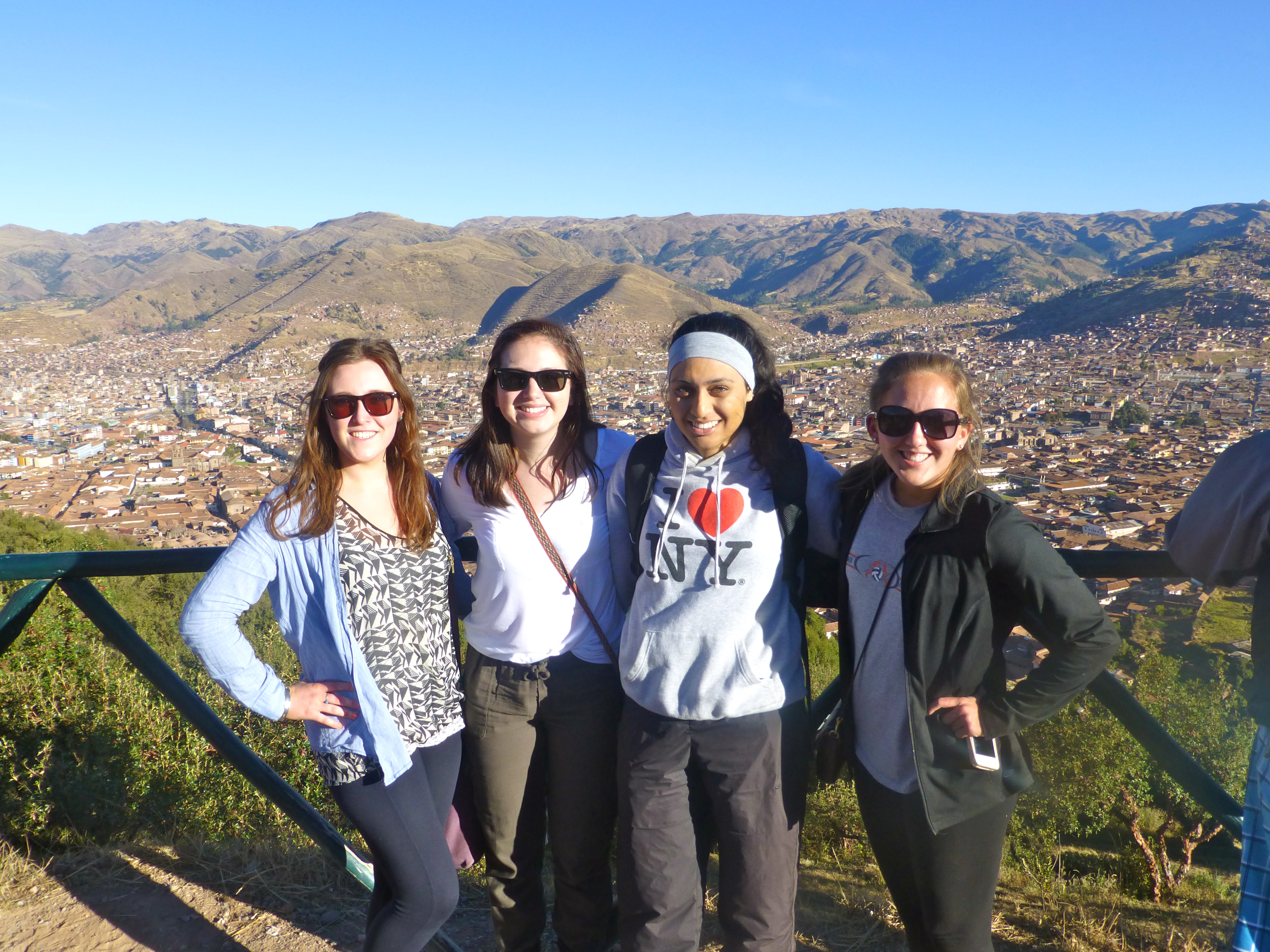 What are the requirements to be a part of the summer volunteer abroad programs?