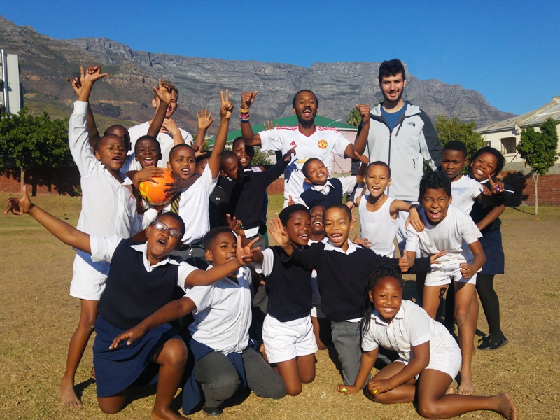 What are the benefits of working for the Sports Development Volunteering Program?