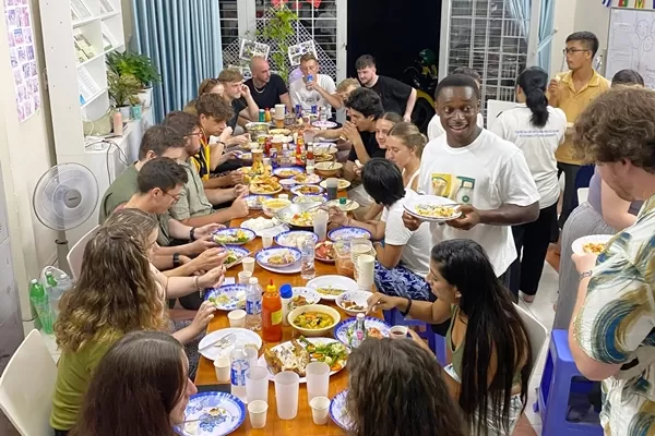 Volunteers eating meals in Ho Chi Minh City